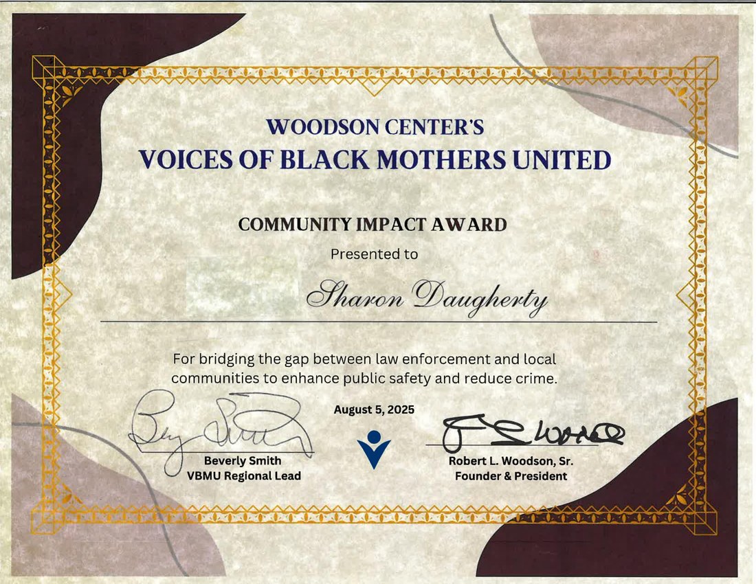 Voices of Black Mothers United Community Impact Award presented to Sharon Daugherty